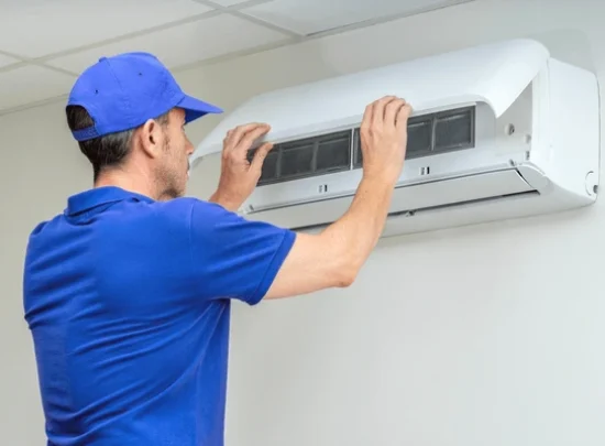 hvac-technician-performing-air-conditioner-600nw-2488702851