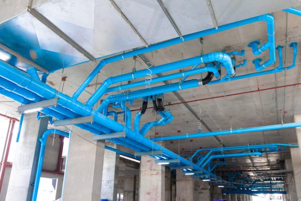 Various systems within the structure of the building under construction.